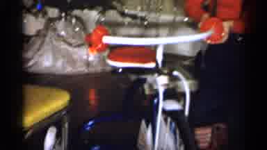 Michigan (1959): Kid Playing With New Present That He Got On Christmas