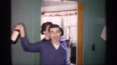 Michigan (1959): Young Man Having Fun With A Bottle In His Hand And Later Holding