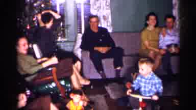 Michigan (1959): A Very Large Family With Children Happily Celebrating Christmas
