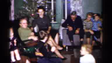 Michigan (1959): Group Of People Gathered In The Living Room For Asthmatic A Few