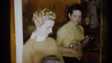 Michigan (1959): Woman Fixes And Plays With Tiny Guitar Before Child Comes Back To