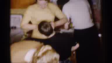 Michigan (1959): A Family Members Enjoys Their Food With Their Children Out In The