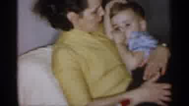 Michigan (1959): Mother And Child Cozily Sit Together As Child Hops Off To Attempt