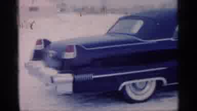 Michigan (1959): A Classic Car Waiting In The Winter Time For Someone To Come From