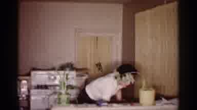 Michigan (1959): Woman Cleaning A Table