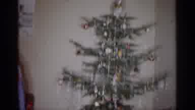 Michigan (1959): The Children Play In The Living Room Neat The Christmas Tree As