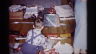 Michigan (1959): A Boy Play The Toy Train In Living Room Your Mother See Your Fun