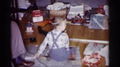 Michigan (1959): Indoor Video Showing A Child Playing With His Toys On The Floor