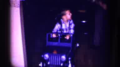 Michigan (1959): Little Boy Driving And Backing Up In A Blue Jeep Power Wheels
