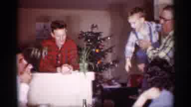 Michigan (1959): A Family Members Enjoys Their Food With Their Children Out In The