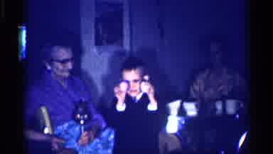 Michigan (1959): Boy Plays With Two Egg Shaped Toys
