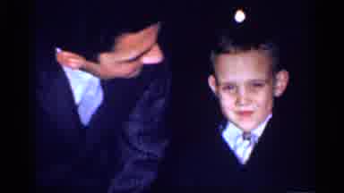 Michigan (1959): Father And Son Are Kissing And They Seem Very Happy
