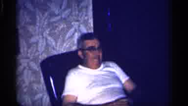 Michigan (1959): Film Cuts From Man In T-Shirt To Women In Kitchen Men In Suits