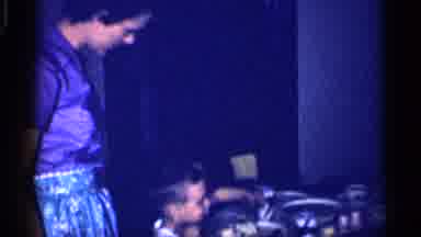 Michigan (1959): A Family Sits Around A Table Enjoying A Meal While A Standing