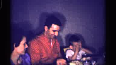 Michigan (1959): A Man Seated At A Dining Table Dishes Mashed Potatoes Onto His