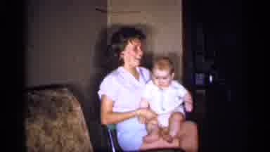 Michigan (1959): A Baby On The Lap Of A Lady And A Baby Crying Next To A Man
