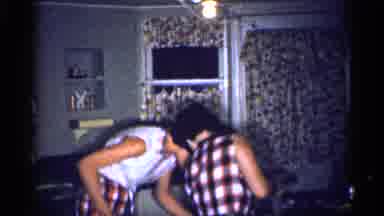 Michigan (1959): Two Women Sitting Yellow Chairs At Table Laughing And Talking