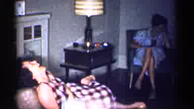 Michigan (1959): Family Enjoying The Living Room Talking And Sharing Time Together