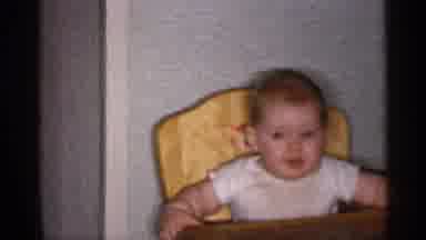 Michigan (1959): Baby What Is Sitting In His Chair While His Mom Is In The Kitchen