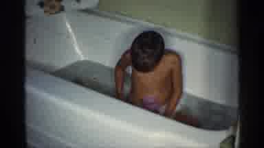 Michigan (1959): A Boy Was Playing In The Dub Water And Enjoys The Summer