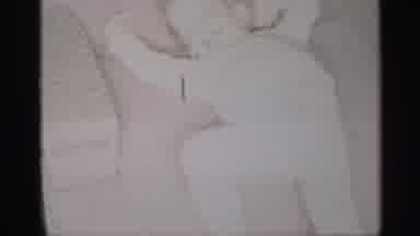 New York (1959): Old Family Video Of Child Kicking Feet On Couch And Sitting In