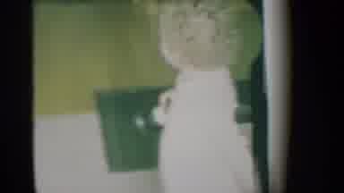 New York (1959): Toddler Wearing White Pants Walks Holding Black Shoe