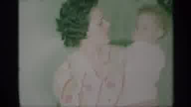New York (1959): A Mom Who Keeps In Her Arm Her Blond Sweet Baby