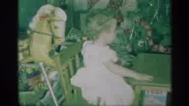 New York (1959): Cute Toddler Girl Touched Christmas Present Rocking Horse