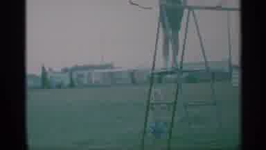 New York (1959): A Man Climbs A Ladder And A Little Boy Runs Towards The Camera