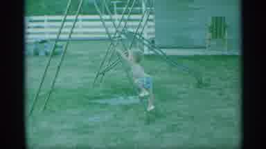 New York (1959): The Little Boy Plays On His Swing Set While His Mom Takes Out The