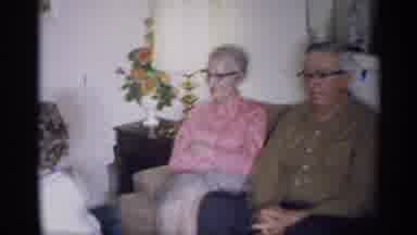 New York (1959): Three Elderly People Sitting On A Couch Watching A Small Child
