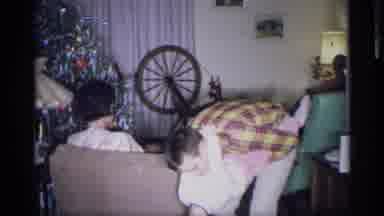 New York (1959): Father Playfully Shakes Daughter Upside Down While Mom Sits On