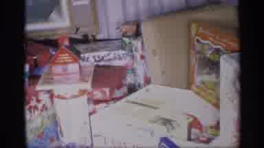 New York (1959): Christmas Panning Shot Of Presents And A Christmas Tree Inside A