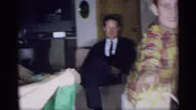 New York (1959): A Mother And Son Open Presents Under A Christmas Tree While Two