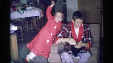New York (1959): Two Young White Siblings Wave At Camera To Show Their Delight
