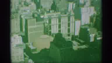 New York (1959): Downward Tilting Shot Of City Skyline In Bright Sunlight Showing