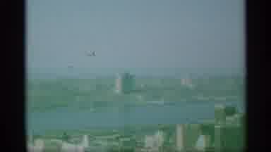 New York (1959): Grainy Footage Showing An Overview Of A City Occupying Both Sides