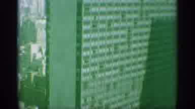 New York (1959): Panning Down The Side Of A Very Tall Building In An Urban Setting