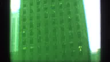 New York (1959): The Camera Pans Up The Tall Building And Captures The Details Of