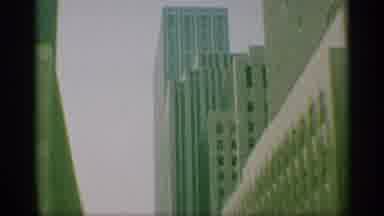 New York (1959): Camera Zooms Out And Pans Across The Building And Captures The
