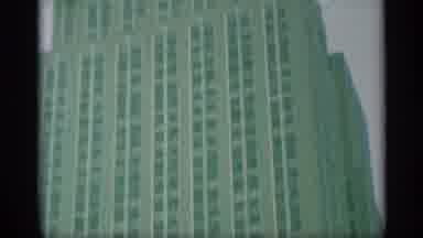 New York (1959): Random Recording Of A Very Tall Skyscraper And Of A Statue