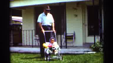 Mississippi (1963): A Man Watches Over A Child Who Is In A Stroller