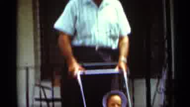 Mississippi (1963): Man Taking A Picture Of A Child In A Pushchair