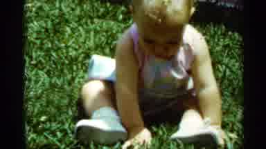 Mississippi (1963): Baby Girl Playing Backyard Attempting Picked Up By Grandma