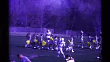 Ohio USA (1969): Football Player Running The Football All The Way To The End Zone