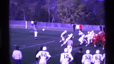 Ohio USA (1969): A Quarterback Dodges As Two Football Teams Play Against Each