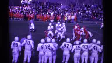 Ohio USA (1969): Football Players Red Team And White Team Playing A Game