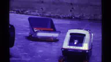 Ohio USA (1969): View Of Blue Sled And Sail Boat In A Clear Day