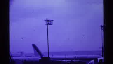 Ohio USA (1969): Airport With A Lot Of Planes While One Of Them Starts To Run To