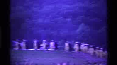 Ohio USA (1969): Graduates In Yellow Or Gold Robes Exit School Building And Walk